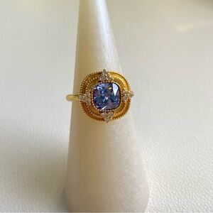 Elegant Gold and Purple Gemstone Ring